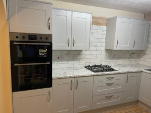 a pictorial view of black stove and microwave