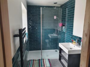 a tidy bathroom with sliding door